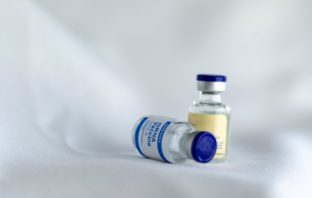 double vaccination cuts long covid