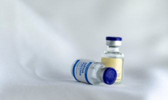 double vaccination cuts long covid