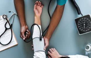future view of living in a modern epidemic https://commons.wikimedia.org/wiki/File:Blood_pressure_monitoring.jpg