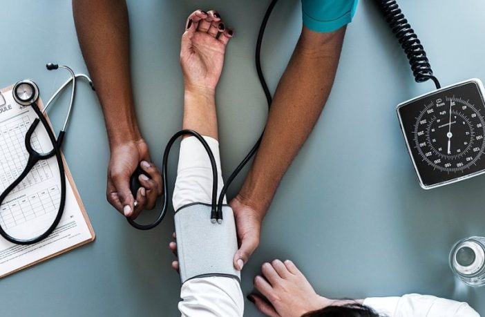 future view of living in a modern epidemic https://commons.wikimedia.org/wiki/File:Blood_pressure_monitoring.jpg