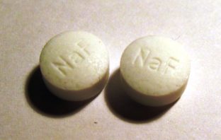 fluoride-ion could see lithium batteries https://commons.wikimedia.org/wiki/File:Sodium_fluoride_tablets.jpg